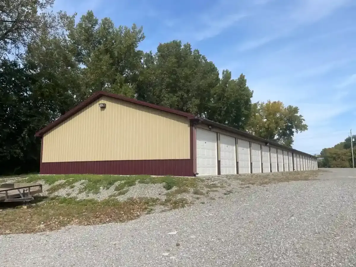 Roll up outdoor storage units on gravel.