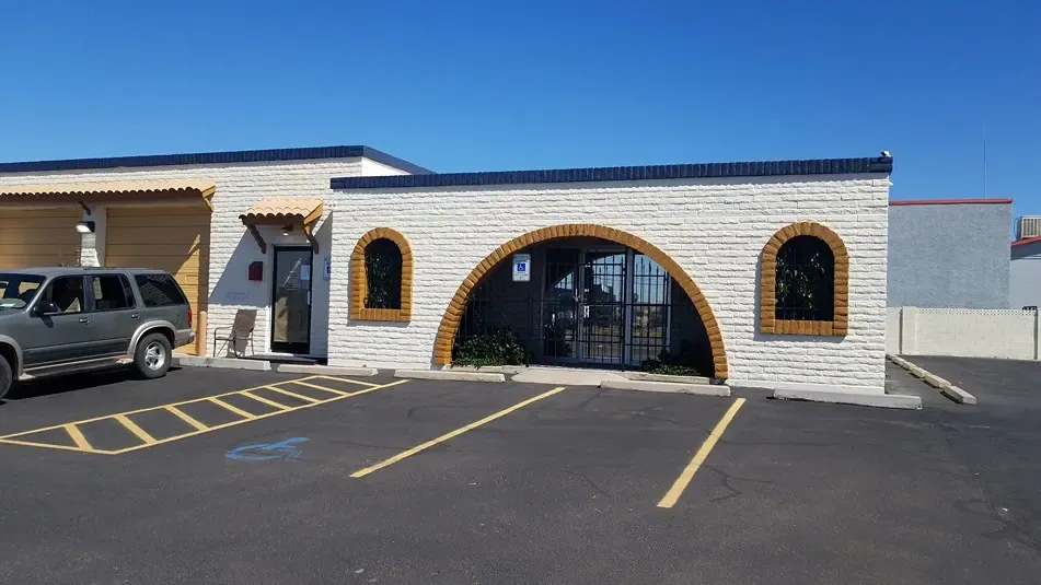 storage facility welcome center with open parking spots