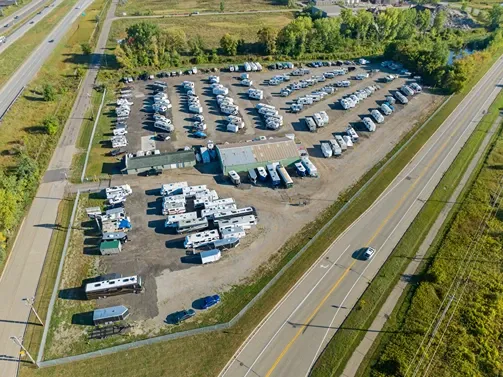 Aerial view of uncovered parking spaces.