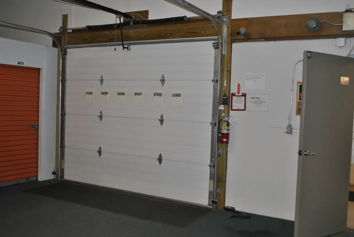 Indoor storage units with roll up door.