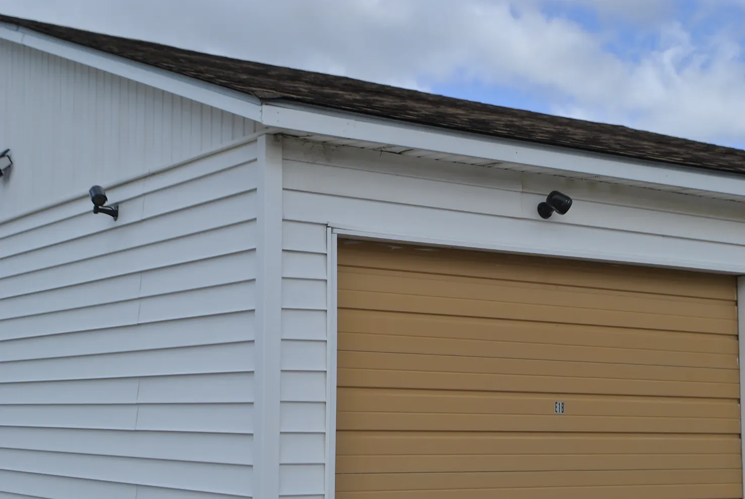 Outdoor storage units with security cameras.