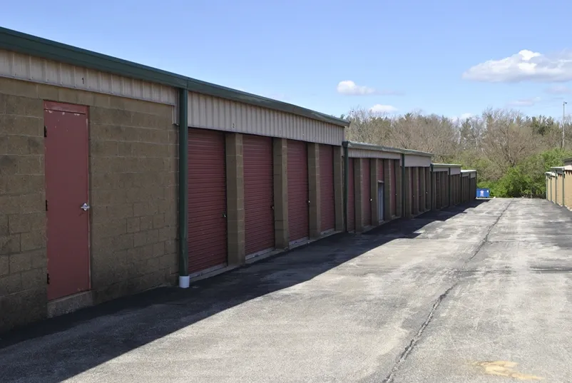 Outdoor storage units with roll up doors.