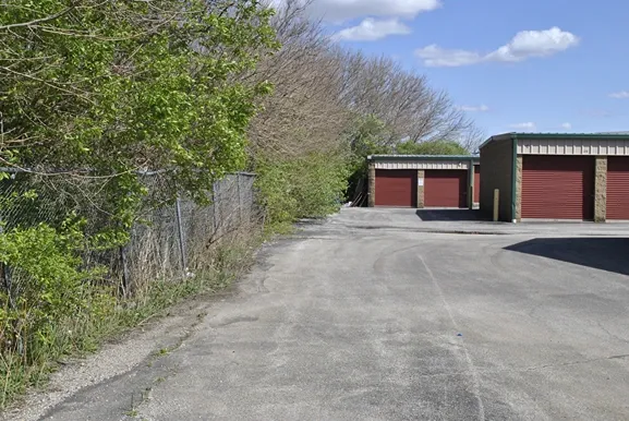 Gated storage facility with paved road.