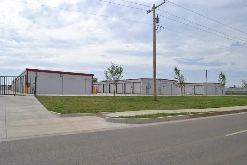 Street view of gated storage facility.