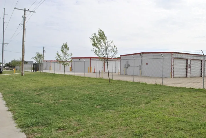 Gated storage facility with outdoor storage units.
