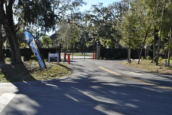 Front entrance of storage facility with open sign.