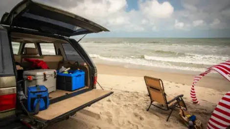 Beach Gear on Beach and In Back of Car